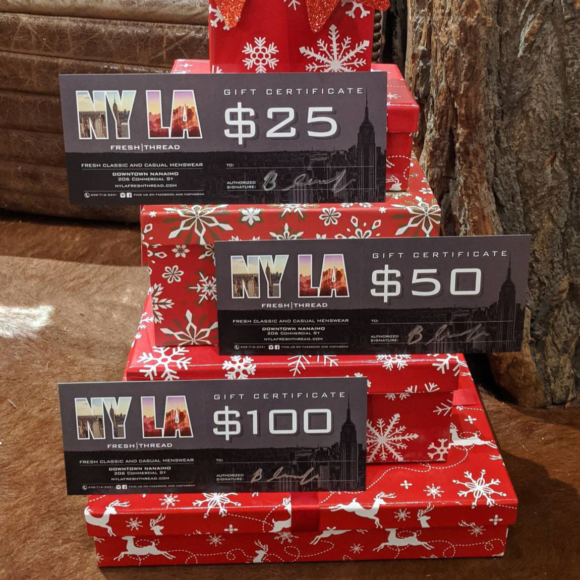 Nyla Fresh Thread Gift Certificates stacked on boxes