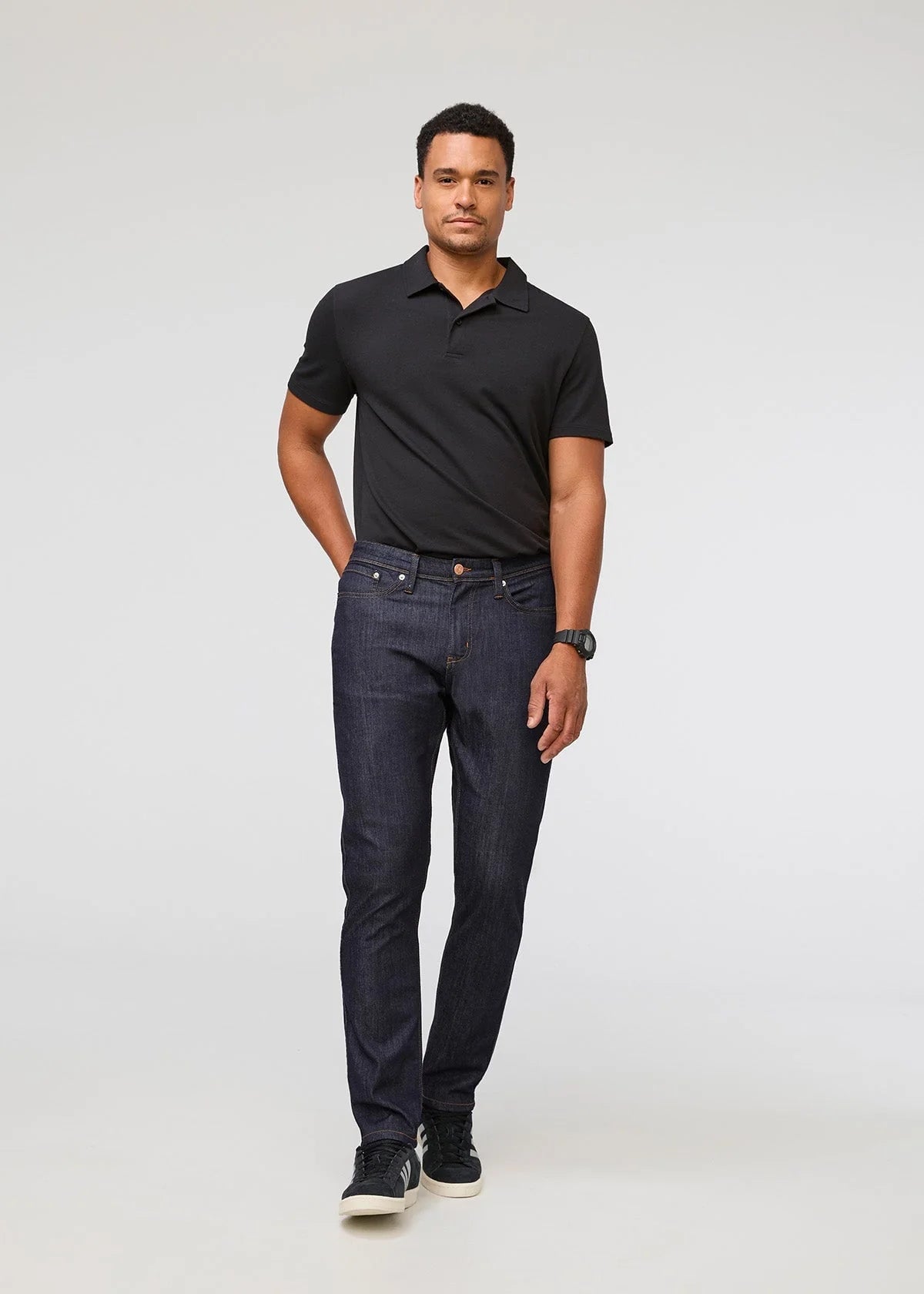 'Du/er Performance Denim Jean Relaxed Taper - Heritage Rinse' in 'Heritage Rinse' colour
