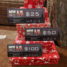 Nyla Fresh Thread Gift Certificates stacked on boxes